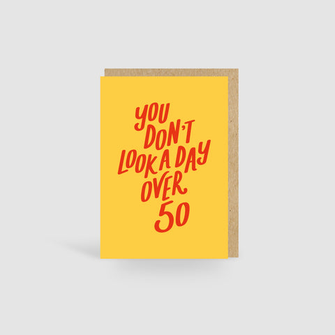 You Don't Look A Day Over 50! Yellow Birthday Card
