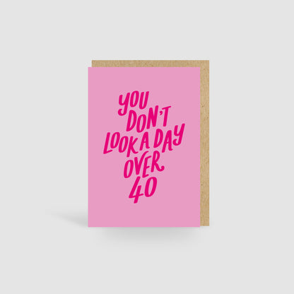 You Don't Look A Day Over 40! Pink Birthday Card