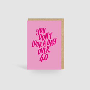 You Don't Look A Day Over 40! Pink Birthday Card
