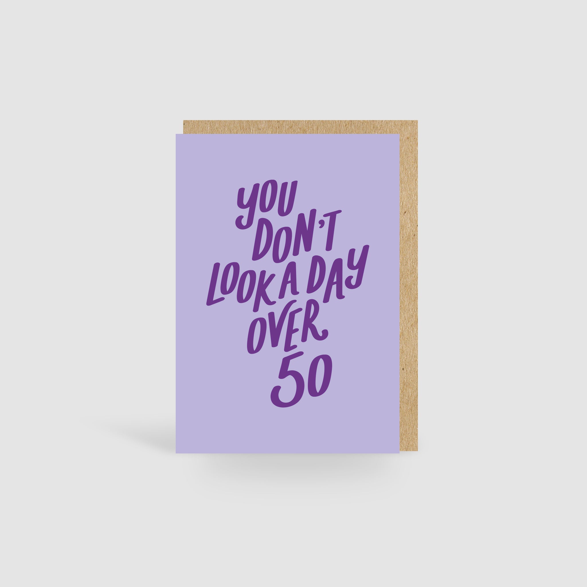 You Don't Look A Day Over 50! Lilac Birthday Card